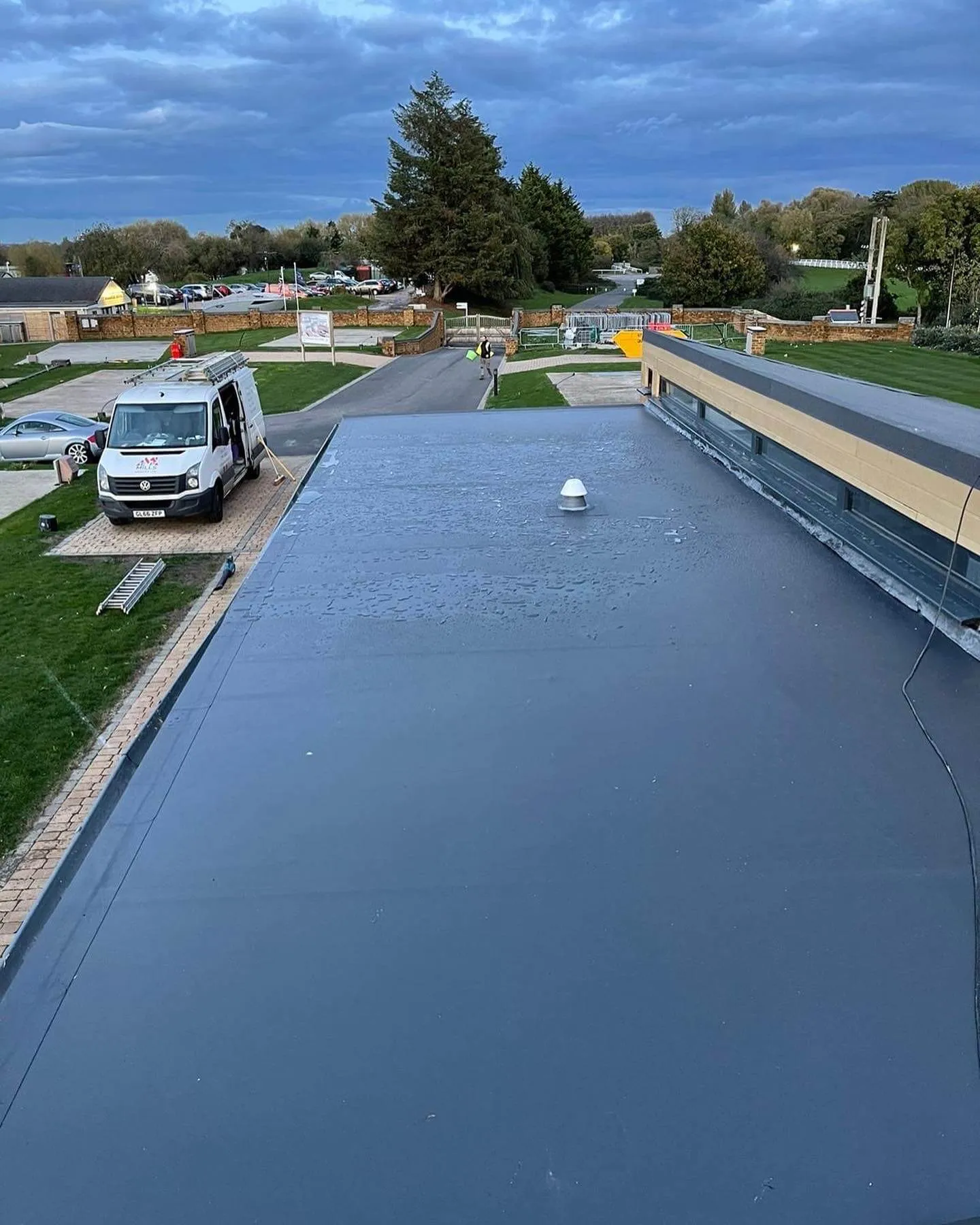 A flat roof being installed on a house.